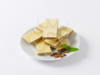 chocolate wafers on white plate