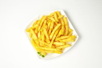 portion of French fries on square plate