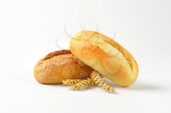three French bread rolls with crisp crust