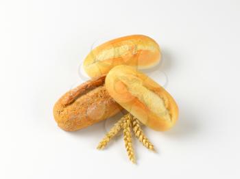three French bread rolls with crisp crust