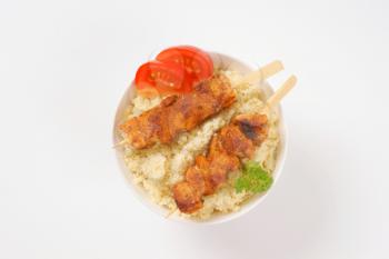 bowl of couscous and spicy chicken souvlaki
