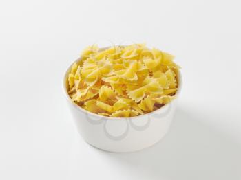 Bowl of uncooked farfalle pasta