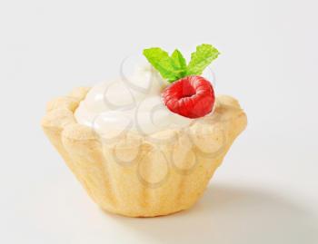 Mini tart shell filled with rich white cream