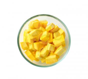 diced yellow pumpkin in a glass bowl