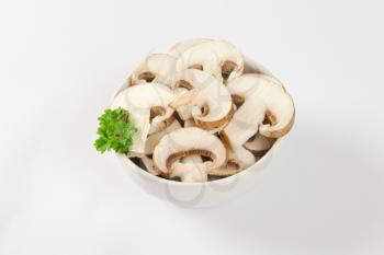 Bowl of sliced fresh mushrooms
