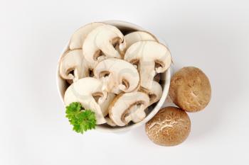 Bowl of sliced fresh mushrooms