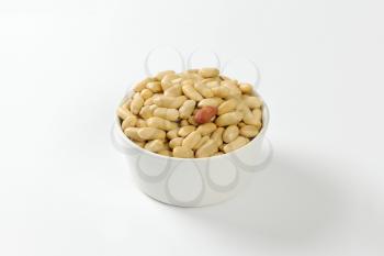Bowl of unsalted shelled peanuts
