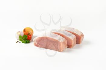 Slices of fresh boneless pork loin