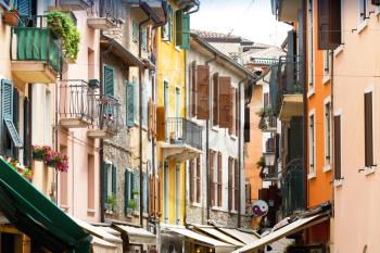 Street view with colorful facades, Garda, Italy