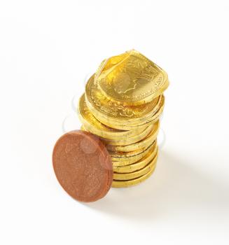 Stack of gold foiled chocolate coins 