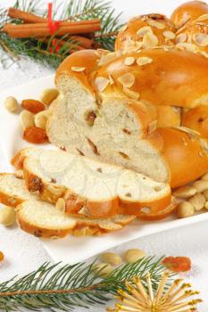 sliced Czech Christmas braided bread with almonds and raisins