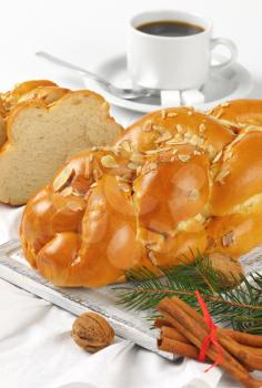 Christmas sweet braided bread and a cup of coffee