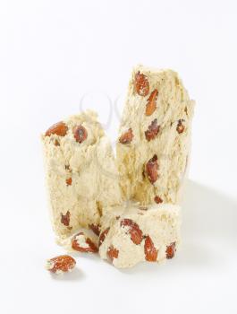 Pieces of Greek halva with almonds