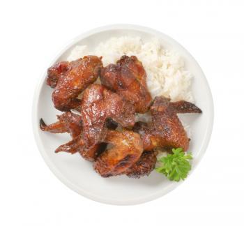 sweet and spicy BBQ chicken wings served with white rice