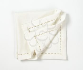Hemstitched white linen dinner napkin