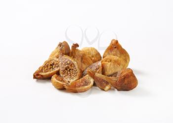 sun dried figs on white background