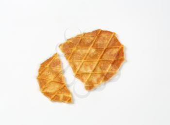 broken butter waffle cookie on white background
