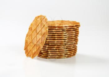 stack of butter waffle cookies on white background