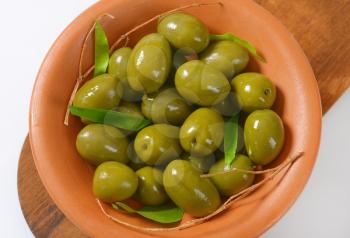 bowl of fresh green olives - close up