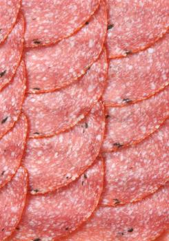 thin slices of spicy salami - full frame