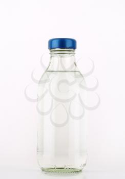 bottle of fresh water on white background