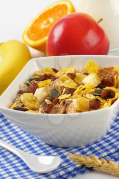 bowl of mixed breakfast cereals with dried fruit