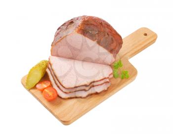 Smoked pork roast on cutting board