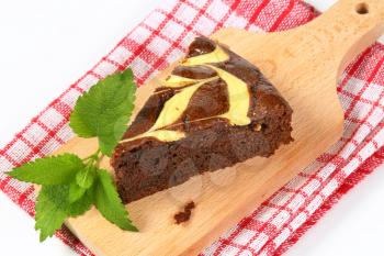 Slice of chocolate spice cake with cheese