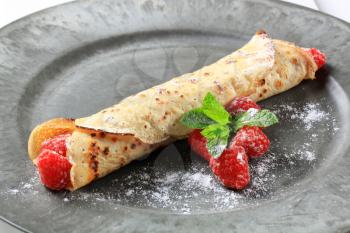 Crepe filled with fresh raspberries