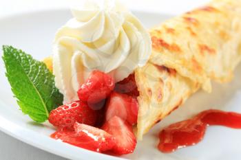 Crepe with fresh strawberries and whipping cream
