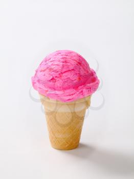 Pink fruit flavored ice cream cone