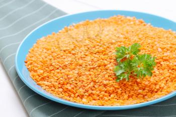 plate of peeled red lentils - close up
