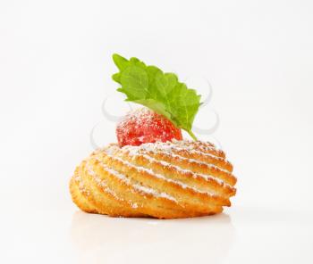 Traditional Sicilian almond cookie topped with glace cherry