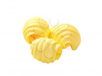 three butter curls on white background