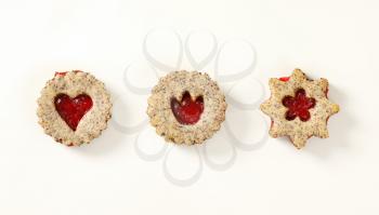 shortbread cookies with jam filling on white background