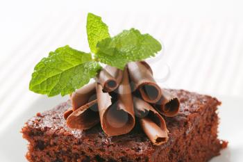 Chocolate curls on brownie cake