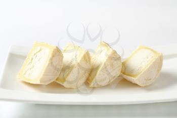 Halved Crottins de Chevre - French goat milk cheese
