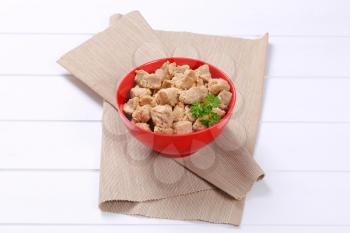 bowl of soy meat cubes on beige place mat