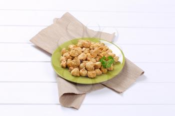 plate of soy meat cubes on beige place mat
