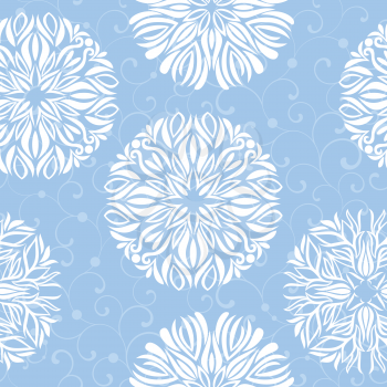 Seamless pattern with snowflakes on a blue background