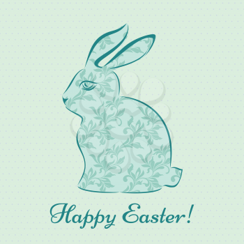 Easter bunny with a flower pattern on a light blue background with polka dots