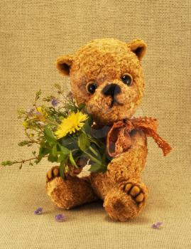 Handmade, the sewed toy: teddy-bear Misha with flowers