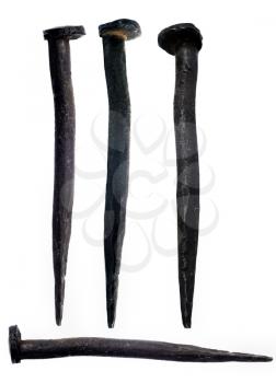 Old Hand-Forged Nails Isolated on White Background, Handmade Manufactured in Siberia, Russia, in the Mid-20th Century