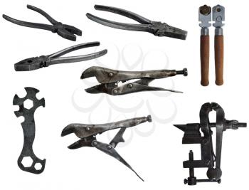Set of old isolated on white tools of 40-50th years of 20th year: flat-nose pliers, glass-cutter, vice, bicycle spanner. Are actively used by Alexcoolok to this day :).
