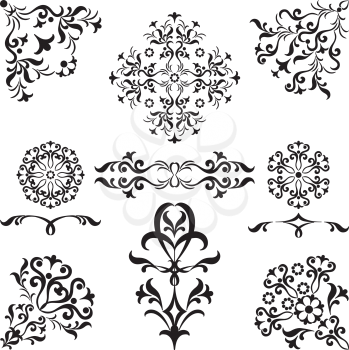 Set of abstract symbolical floral black patterns, design elements, isolated on white. Vector