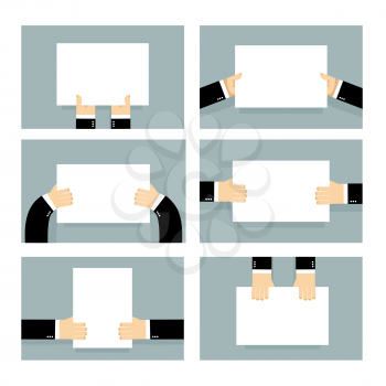 Hand and clean sheet blank billboard set. Business man holding an empty form. Place for your text. man in suit keeps fingers white banner. Top view of human hands. Hand and blank set