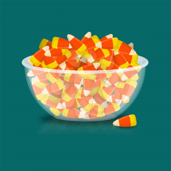 Bowl and candy corn. Sweets on plate. Traditional Treats for Halloween
