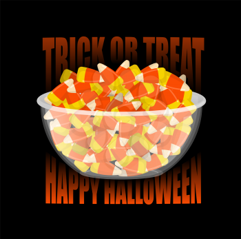 Trick or treat. Happy Halloween. bowl and candy corn. Sweets on plate. Traditional treat for terrible holiday.
