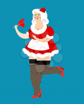 Mrs. Santa Claus and lollipop. Christmas woman and mints. Sexy female in short red dress and santa hat. Blonde New Year costume. Xmas girl
