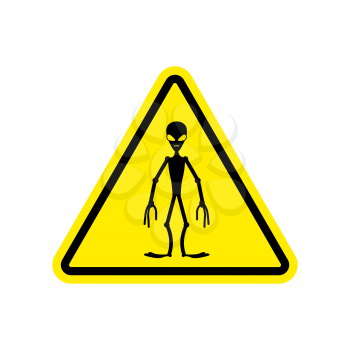 UFO Warning sign yellow. Alien Hazard attention symbol. Danger road sign triangle invader
